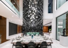 Mesmerizing-marble-fireplae-coupled-with-stunning-chandelier-in-the-dining-space-58754-217x155