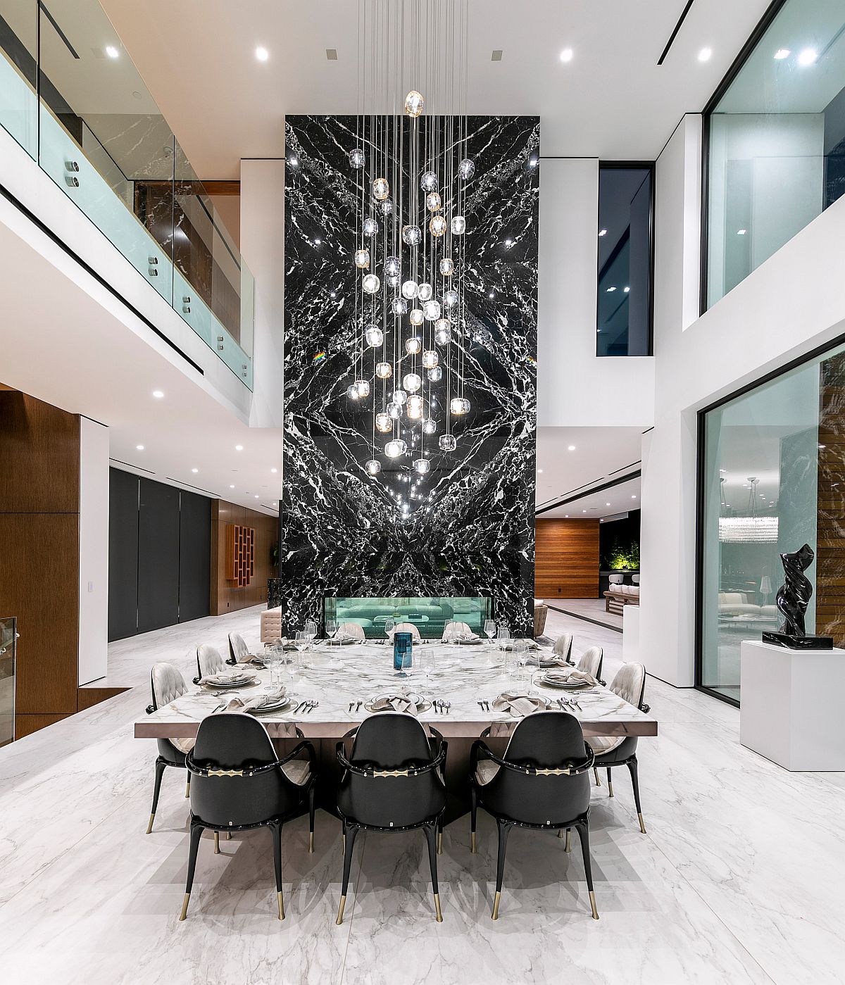 Mesmerizing-marble-fireplae-coupled-with-stunning-chandelier-in-the-dining-space-58754