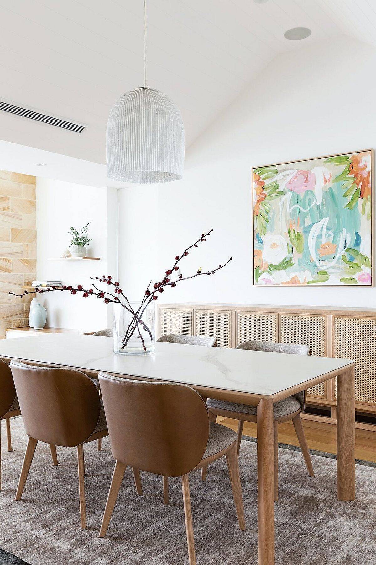 Multi-colored-wall-art-piece-is-perfect-for-the-breezy-beach-style-dining-space-78841