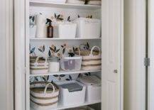 bathroom closet linens baskets with storage containers wallpaper backing toilet paper towels